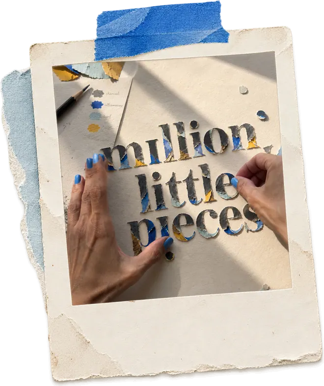 Hands lifting the words million little pieces, cut from torn paper.