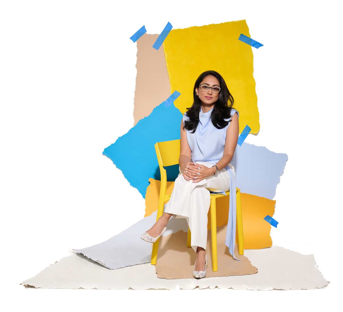 Founder of Million Little Pieces seated among a colorful torn-paper collage